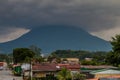 LA FORTUNA, COSTA RICA - MAY 8, 2016: Volcano Arenal soaring behind La Fortuna villag