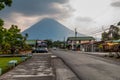 LA FORTUNA, COSTA RICA - MAY 8, 2016: Volcano Arenal soaring behind La Fortuna villag