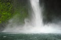 La Fortuna Waterfall pounds down to create a cooling mist. Royalty Free Stock Photo