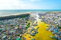 La Gi fishing village seen from above with hundreds of boats anchored along both sides of river Royalty Free Stock Photo