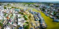 La Gi fishing village seen from above with hundreds of boats anchored along both sides of river Royalty Free Stock Photo