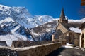 La Grave Ecrins National Park. The church of Notre Dame de l`Assomption de la Grave in winter with La Meije Peak. Autes-Alpes Royalty Free Stock Photo