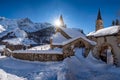 La Grave, Hautes-Alpes, Ecrins National Park, Alps, France: The local village of La Grave and its church in Winter Royalty Free Stock Photo