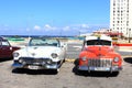 La Habana, Cuba - November 14th of 2014: Old american cars provide taxi service to tourist all along the city Royalty Free Stock Photo