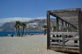 La Herradura beach with a wooden structure, palm trees