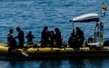 LA HERRADURA, SPAIN - JUNE 14, 2018 A group of divers floating o Royalty Free Stock Photo