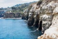 Cliffside rock erosion caves Royalty Free Stock Photo