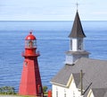 La Martre Lighthouse and church, Quebec Royalty Free Stock Photo