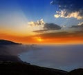 La Palma muntains sunset with orange sun Royalty Free Stock Photo