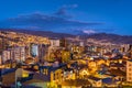 La Paz, Bolivia, Aerial View of Cityscape Including Illimani Mountain and Residential Buildings Illuminated at Night