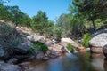 La Pedriza National Park on the southern slopes of the Guadarrama mountain range in Madrid, with cascades. It is one of the larges