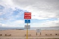 signage at sandy beach with sign no alcohol, no tents or canopies allowed,no alcohol at the beach