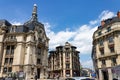 La Poste Dijon Grangier and Anny B buildings against blue cloudy sky on a sunny day in Dijon, France