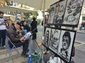 La Rambla, Barcelona, December 2015-street artist drawing caricature of man