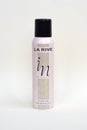 La rive IN woman deodorant bottle on beige background. LA RIVE S.A. is one of the leading producers of perfumes and perfumed Royalty Free Stock Photo