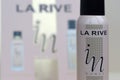 La rive IN woman deodorant and perfume bottles on prefume box background. LA RIVE S.A. is one of the leading producers of perfumes Royalty Free Stock Photo