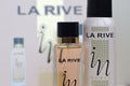 La rive IN woman deodorant and perfume bottles on prefume box background. LA RIVE S.A. is one of the leading producers of perfumes Royalty Free Stock Photo