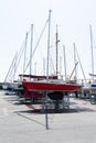 Sailboats yachts stored up in dry boat storage waiting for boat ship maintenance