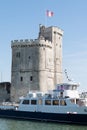 La Rochelle , Aquitaine / France - 11 19 2019 : view of Tour de la chaine with tourist boat go to fort boyard in La Rochelle