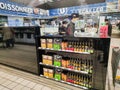 Assortments of sauces and fresh Japanese products in the hypermarket with cooks preparing