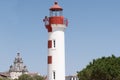 La Rochelle white and red lighthouse on sunny day in southwest france Royalty Free Stock Photo