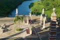 Tourists sit at the square in Altos de Chavon village in La Romana, Dominican Republic. Royalty Free Stock Photo