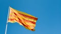 La Senyera, the red and yellow flag of Catalonia flying in Girona, Spain Royalty Free Stock Photo