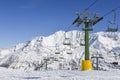 Chairlift at snow covered Italian ski area in the Alps - winter sports concept with copy space Royalty Free Stock Photo