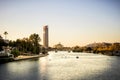 Siville - View of Siville Tower Torre Sevilla of Seville, Andalusia, Spain over river Guadalquivir at sunset