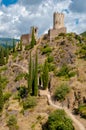 La Tour Regine and Cabaret towers with walking path at Lastours