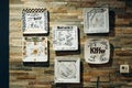 Signed decorative plates displayed on the wall at La Tuque Deli restaurant Royalty Free Stock Photo