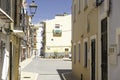 La Vila Joiosa, Spain - April 24, 2024: View to beautiful Villajoyosa street with multi-colored houses. Villajoyosa Royalty Free Stock Photo