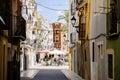 La Vila Joiosa, Spain - April 24, 2024: View to beautiful Villajoyosa street with multi-colored houses. Villajoyosa Royalty Free Stock Photo