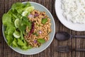 Laab gai or larb gai, healthy spicy minced chicken breast salad in Isan Thai food style