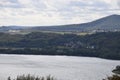 Laacher See with Maria Laach and Bell on the hill Royalty Free Stock Photo