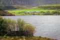 Farm buildings on the bank of lake Cregennan