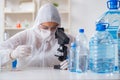 The lab assistant testing water quality Royalty Free Stock Photo