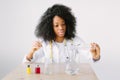 Lab assistant testing water quality. Portrait of a young beautiful African American girl researcher chemistry student Royalty Free Stock Photo