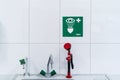 Lab eye wash station, first aid kit and information board Royalty Free Stock Photo