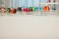 Lab Glassware on White Desk with Copyspace Royalty Free Stock Photo