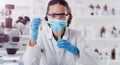Lab plant analytics, woman scientist mask and ecology pour of a employee with science work. Laboratory worker, medical Royalty Free Stock Photo