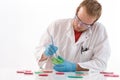 Lab technician hand planting a petri dish Royalty Free Stock Photo