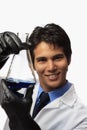 Lab technician holding a flask Royalty Free Stock Photo