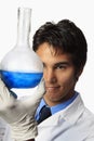 Lab technician holding a flask Royalty Free Stock Photo