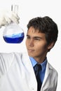 Lab technician holding a flask Royalty Free Stock Photo