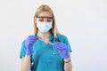 Lab technician holding swab collection kit,Coronavirus COVID-19 specimen collecting equipment,DNA nasal and oral swabbing for PCR