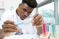 lab technician working with pipette in molecular laboratory