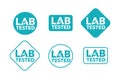 Lab tested sign - microscope intergated in word Royalty Free Stock Photo