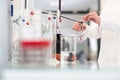 Lab worker's hands while at work at a research center in a lab, Royalty Free Stock Photo