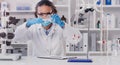 Lab worker, woman scientist and chemical pour of a employee with science work. Laboratory, medical test and chemistry Royalty Free Stock Photo